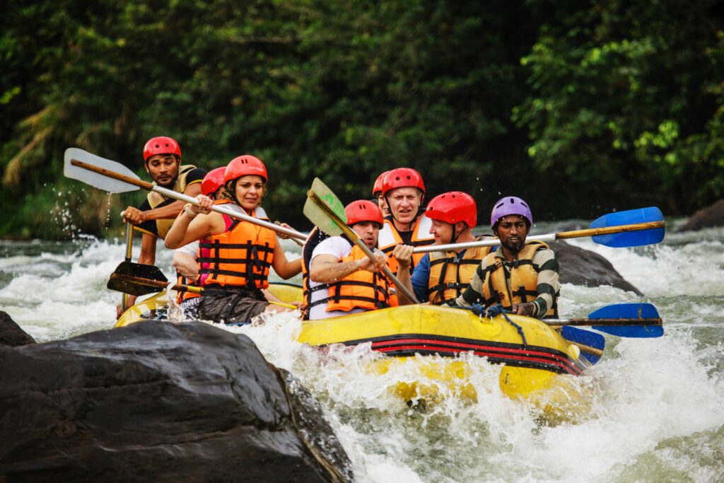 Foreigners engaging in White Water Rafting in Kithulgala