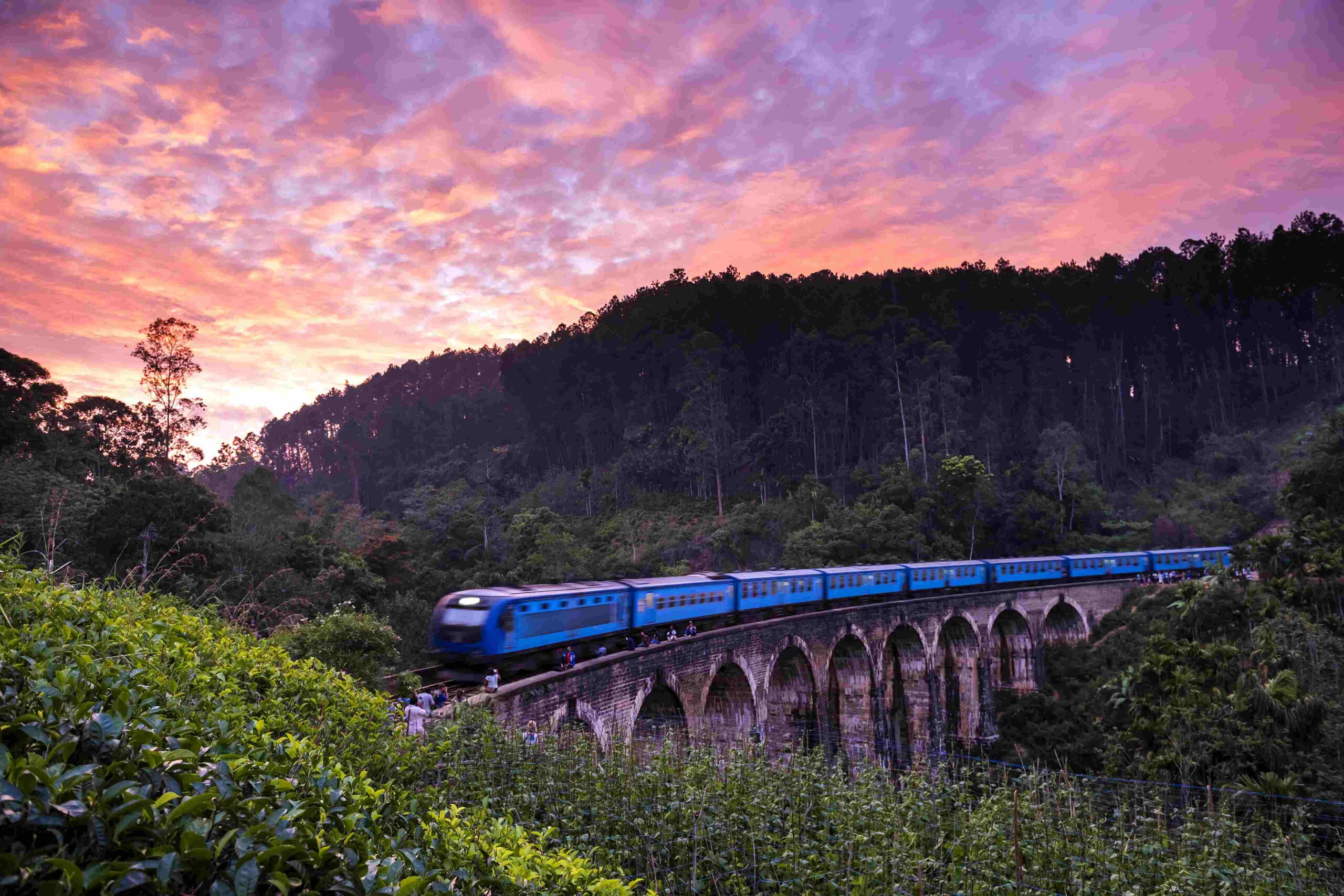 A train moving on the railway track in Nine Arches Bridge